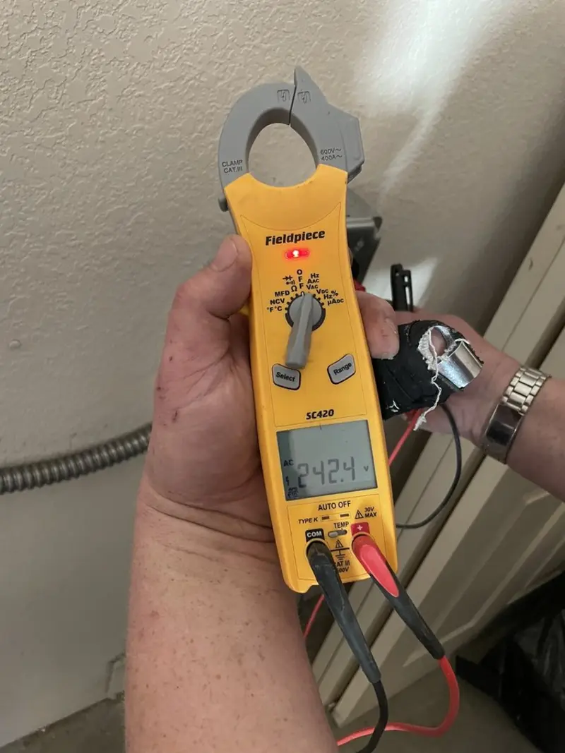 Voltage testing with clamp meter during Generator Installation in Billings